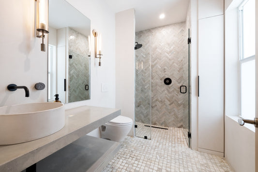 Modern Bathroom with Trendy Tiles on the Floor and Shower Walls