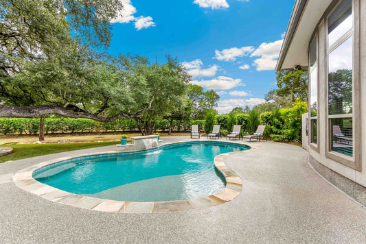 Home with an Unconventionally Shaped Swimming Pool