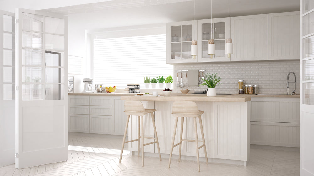 White Appliances Next to Cream Kitchen Cabinets - Soul & Lane
