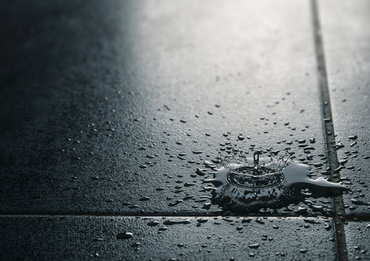 water dripping on tile floor